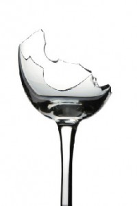 close up of broken wine glass. conceptual photo. white background